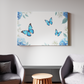 Blue Butterfly Dance Amid Blossoms